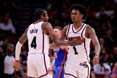 Houston Rockets guard Amen Thompson (1) is congratulated by Houston Rockets guard Jalen Green (4) after a made basket against the Oklahoma City Thunder during the fourth quarter at Toyota Center.